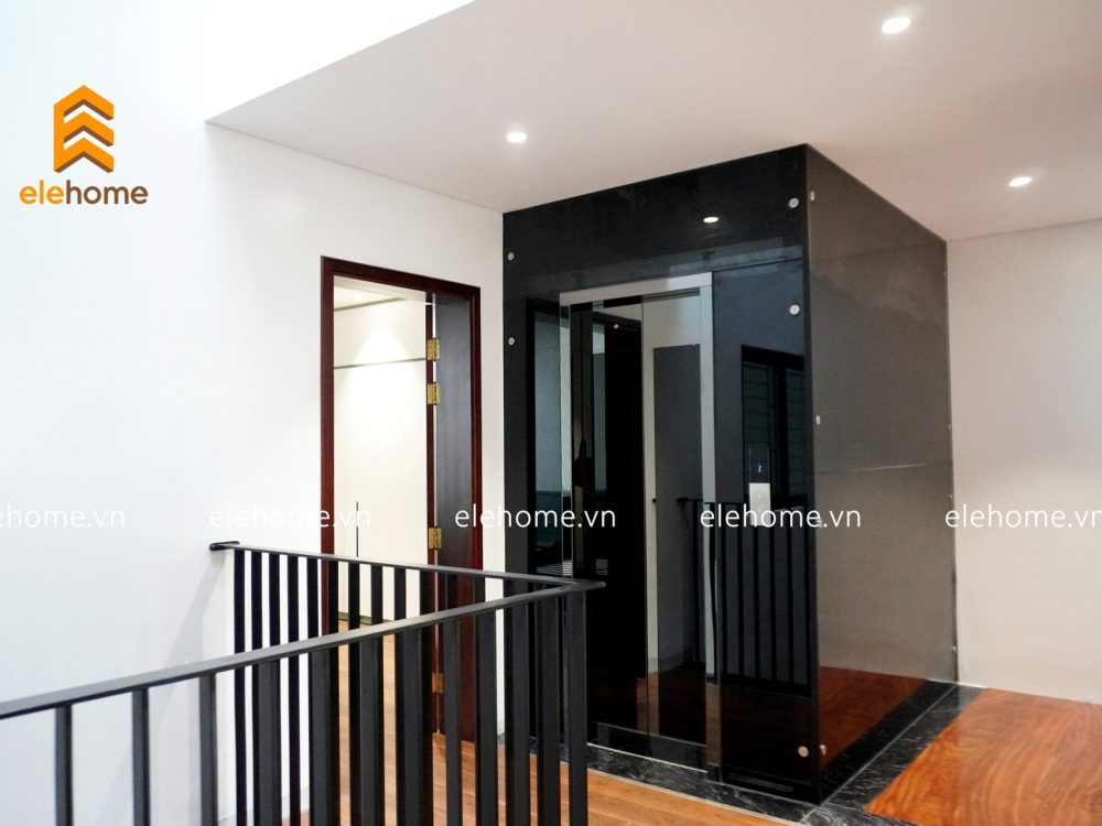 thang máy kính gương đen 5