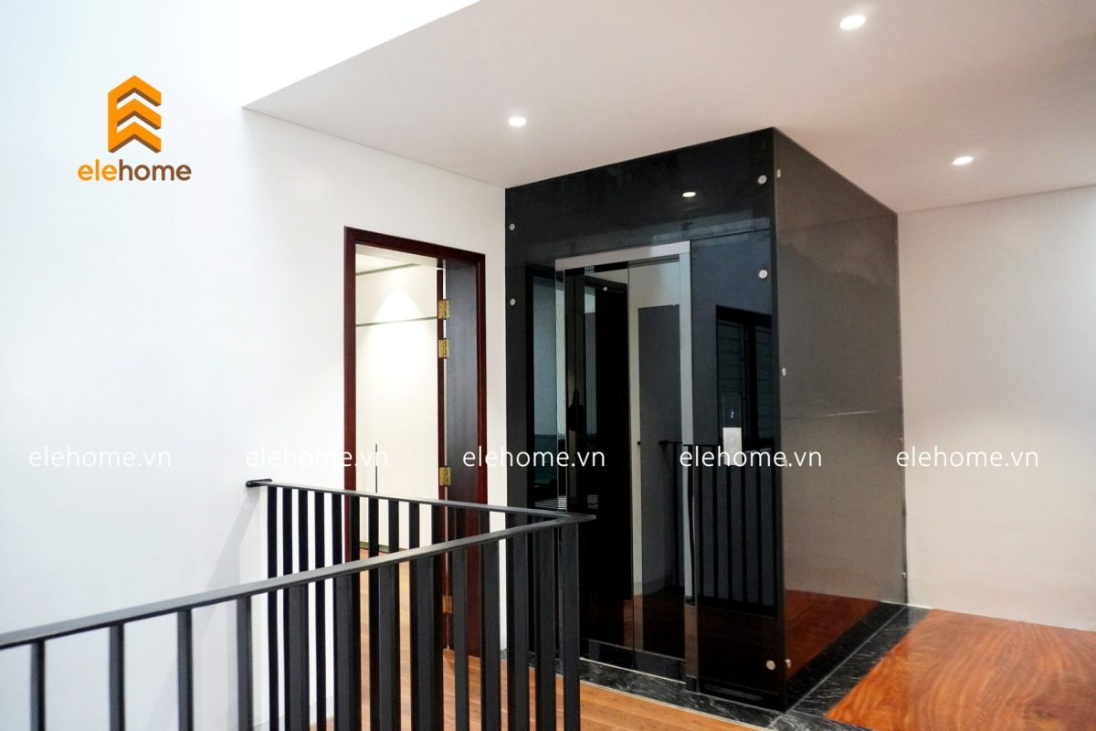 thang máy kính gương đen 5